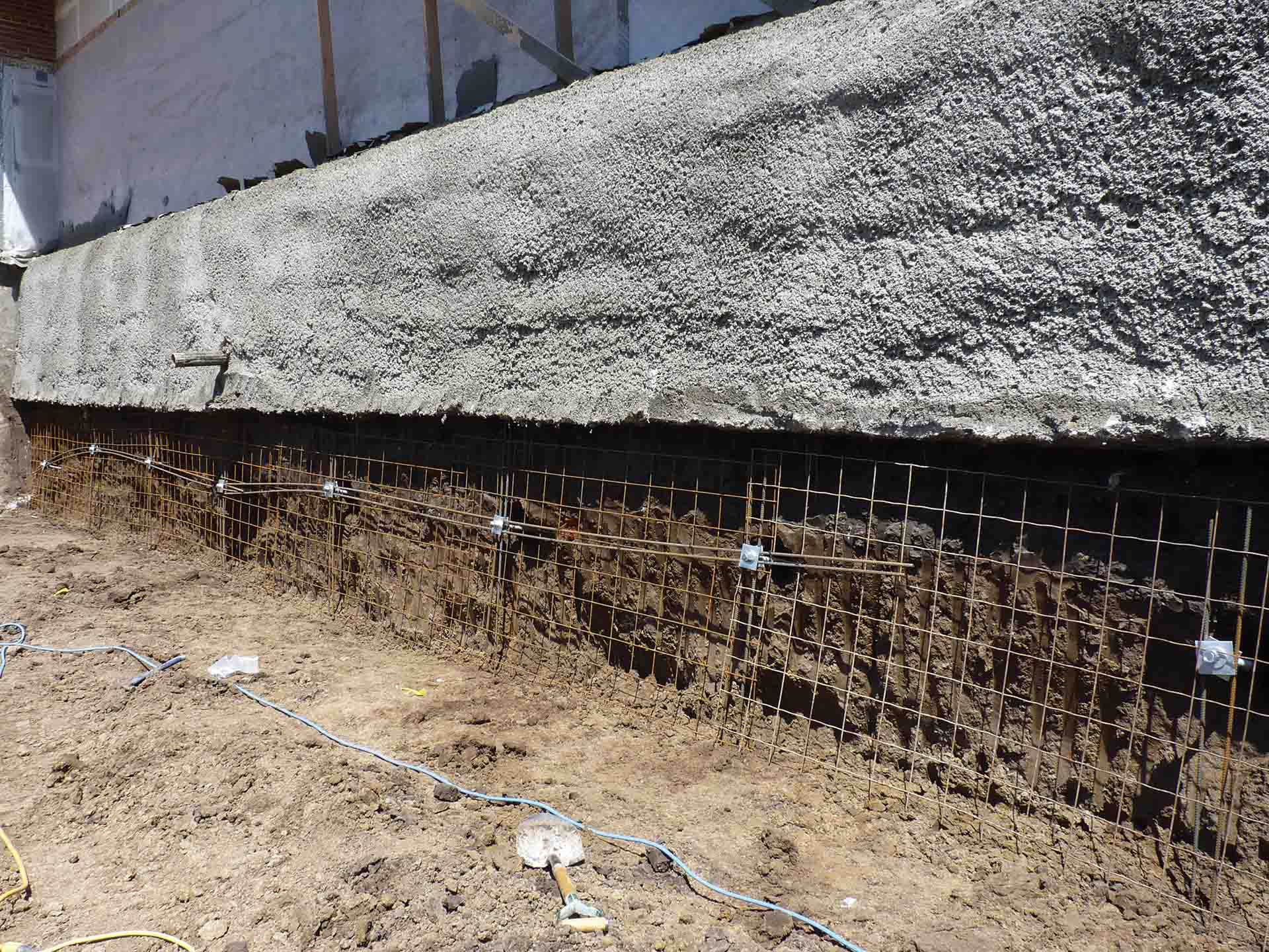 soil nails installed under building